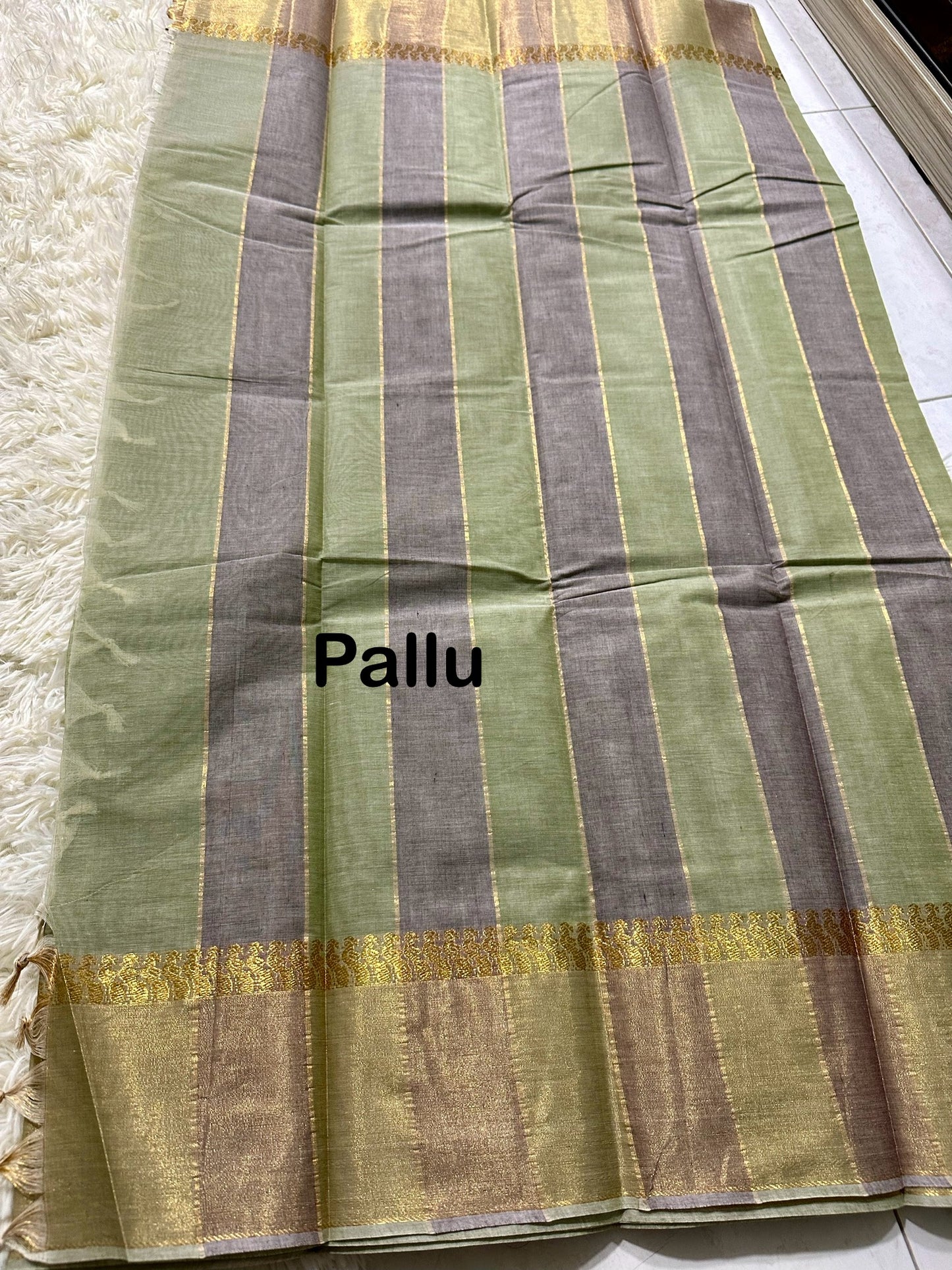 Pastel green cotton saree with gold jari